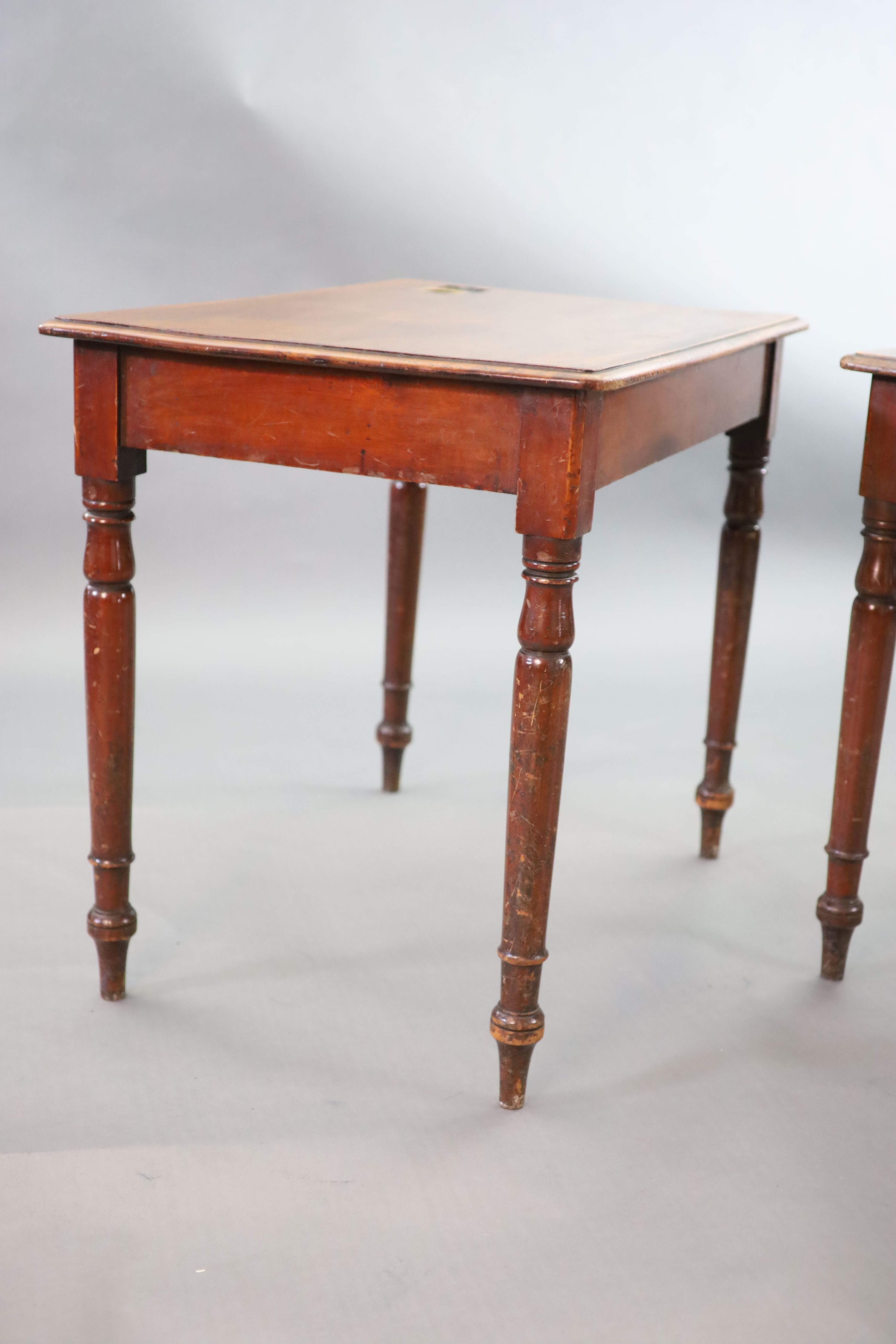 A pair of Victorian mahogany writing tables, W.92cm D.60cm H.76cm